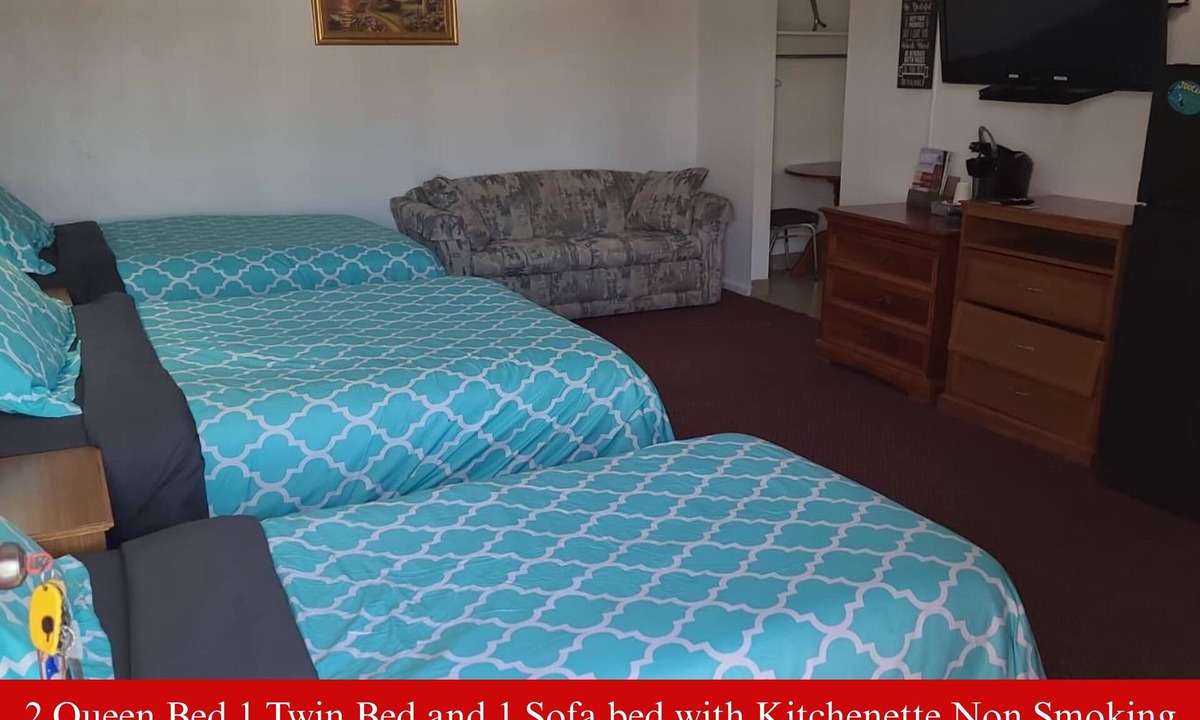Hutchinson Hotel | Coratel Inn & Suites Hutchinson-2 Queen Bed NS -1 Queen Bed and 1 Full Bed