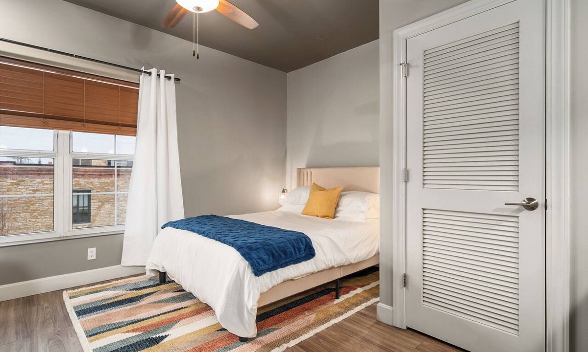 Lawrence Apartment | Downtown Lawrence Condo 1 Block to Mass St Walk to KU Hot Tub Sleeps 4