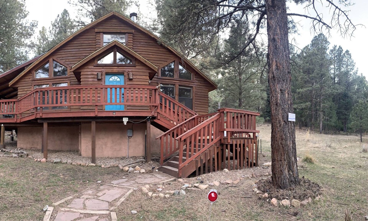 Angel Fire Cabin | Enjoy the hot tub under the stars and ponderosa pines!
