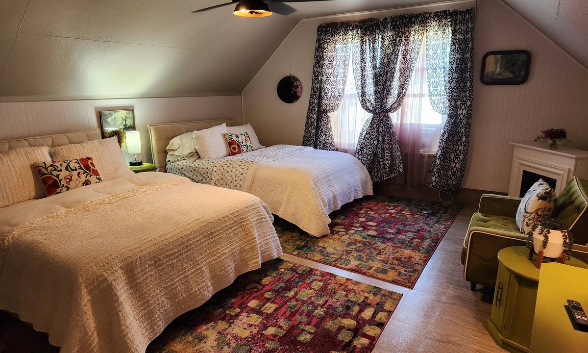 Lansing House | Enjoy the top floor of this victorian house With two suites & a bonus bedroom