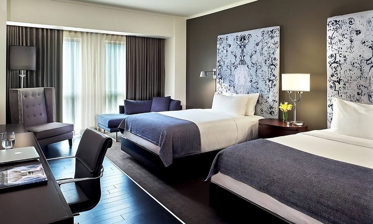 West Plaza Hotel | Family Getaway! 2 Spacious Units, Pool, Pets Allowed Near Rockhurst University!