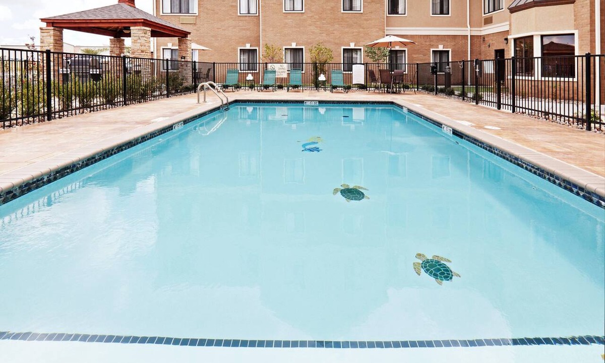 Oklahoma City Condo | King Suite. Free Breakfast Buffet Daily. Outdoor Pool.