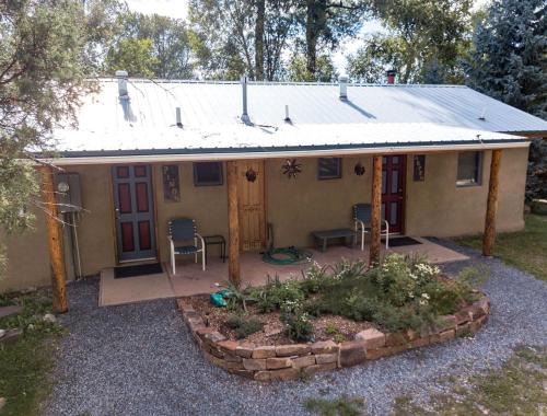 Pecos House | Serenity by the River: Romantic Cabin with Fireplace in San Miguel County, New Mexico
