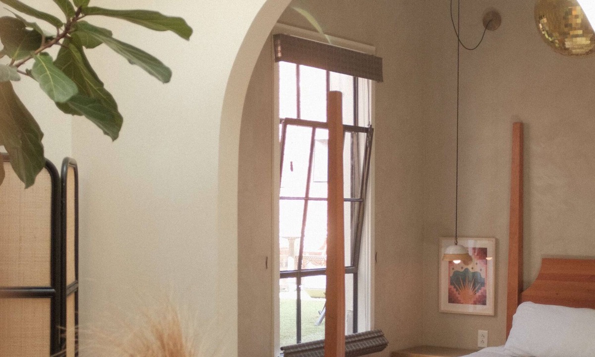 Crossroads Arts District Hotel | Studio One · The Terracotta Sunset Suite