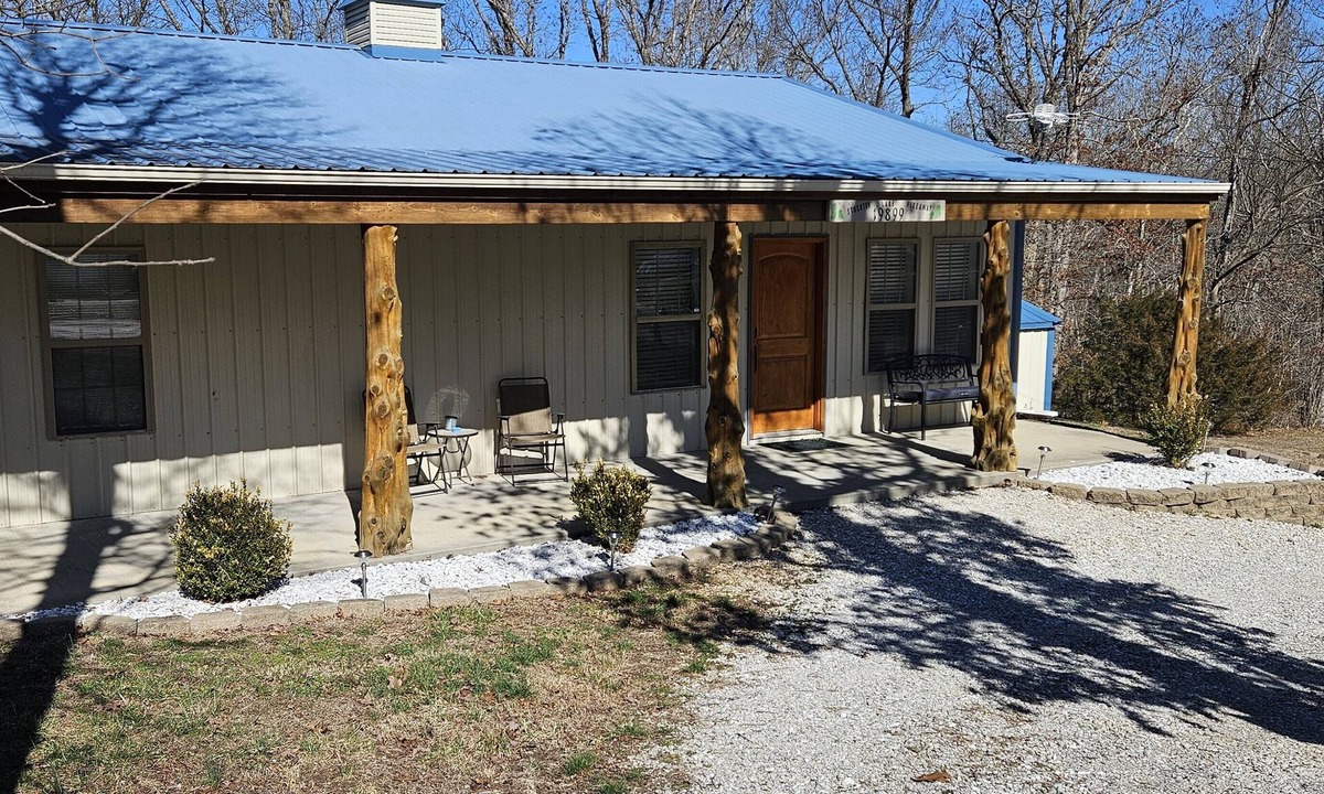 Dunnegan House | Unplug and unwind at this 2BR/2BA Hideaway, just a short walk to a swimming/fishing cove, backing to peaceful Corps land. Enjoy mornings in nature, afternoons by the water, and evenings around the firepit—perfect for couples, families, or friends!