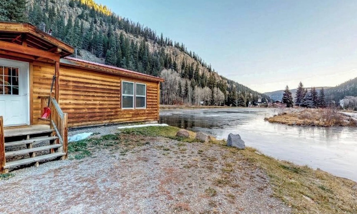 South Fork Cabin | Waterfront cabin with private hot tub, furnished deck, wood stove, & free WiFi