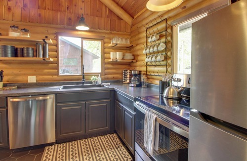 Breezy Point Cottage | 1 Mi to Beach & Lake: Breezy Point Cabin w/Yard!