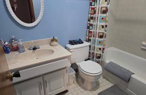 Olathe House | 4-bedroom house in Olathe w/fitness equipment and finished basement.