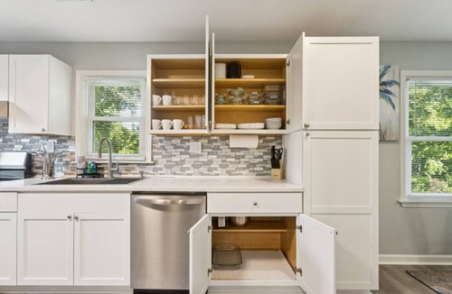 Kansas City House | Beachy Haven Duplex - 3BR/2BA, Pet-Friendly with Firepit