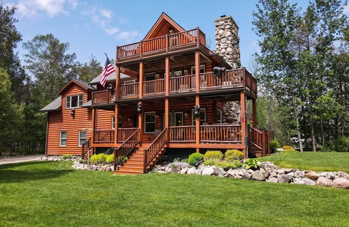 Alanson House | Bear Cabin - Waterfront - Huge Yard + Hot Tub - Peaceful Setting - EV Charger