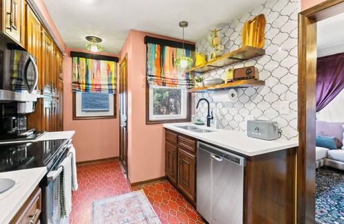 Joslyn Castle House | Blackstone District Family Friendly—Your Retro-Luxe Home w/Theater, Arcade & Bar