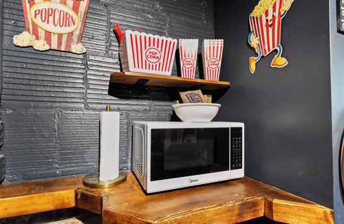 Joslyn Castle House | Blackstone District Family Friendly—Your Retro-Luxe Home w/Theater, Arcade & Bar