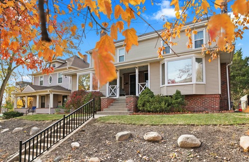 Joslyn Castle House | Blackstone District Family Friendly—Your Retro-Luxe Home w/Theater, Arcade & Bar
