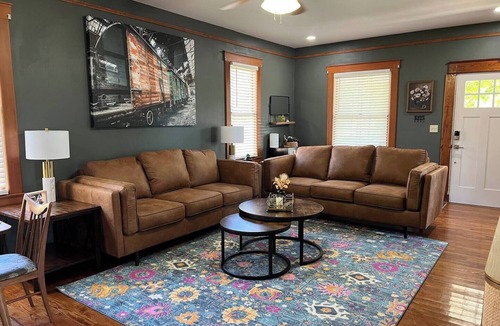 Woodward House | Blue house on 5th! Arcade room, fire pit, privacy fenced yard, and more!