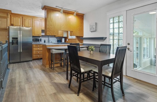 Sarpy County House | Bright & Cozy Home - Sunroom, Games & Foosball in La Vista, NE