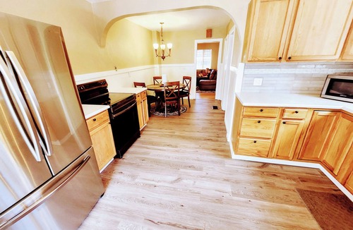 Aberdeen House | Charming 1938 Pueblo Home with Game Room, Firepit and Boho Bedroom
