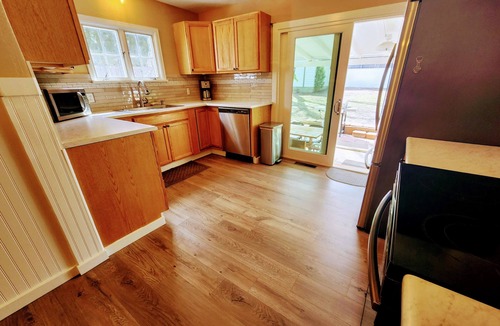 Aberdeen House | Charming 1938 Pueblo Home with Game Room, Firepit and Boho Bedroom