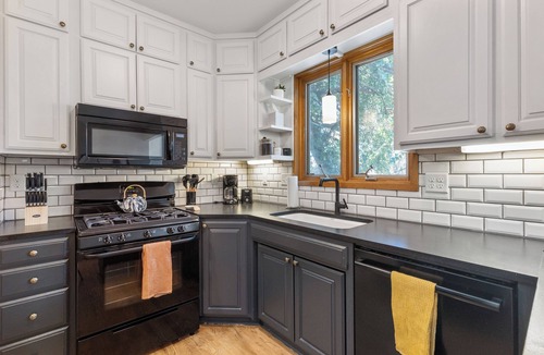 Medical Center House | Charming 4-bedroom house 2 bath house - 10 minutes from CWS in welcoming Omaha