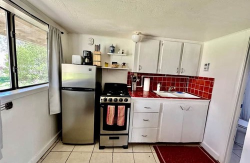 San Cristobal Cabin | Charming Log Cabin Rental on Eco-Farm near Taos Ski Valley