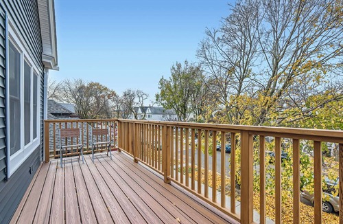 Irving Park East Apartment | Clean & sunny, 2bd, private deck, 15min to Wrigley!