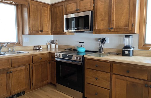 Sturgeon Bay House | Cliffside Egg Harbor Retreat With Sweeping Bay Views on 5 Wooded Acres