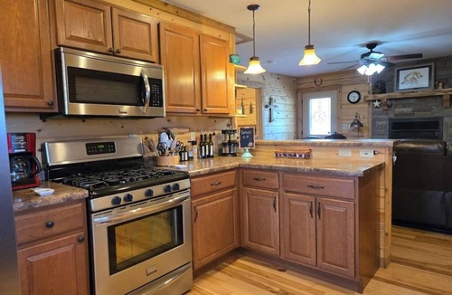Alpine Village Cabin | Conveniently located cabin with full kitchen, w/d, large deck & great views
