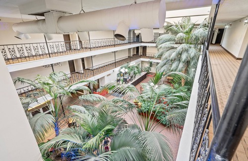 Wichita Hotel | Coratel Suites Deluxe 1 King Suite with Sofa Oversized Non Smoking