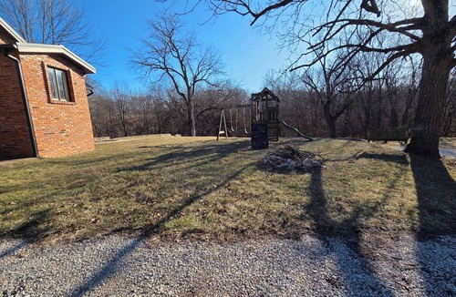 Kansas City House | Country Quiet in the City - Easy Access to Legends & Downtown - 4 BR Brick Home