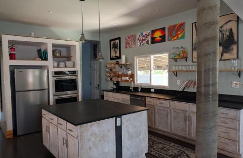 Elyria Swansea Villa | Denver Oasis 5BR Home with Hot Tub, Sleeps 16