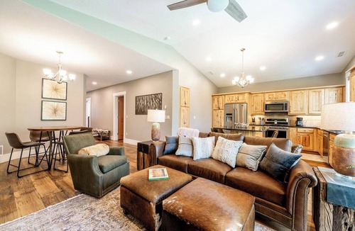 Sheridan Condo | Elegant 2BD, 2BA creekside retreat in Powderhorn Golf Community. This private guest suite comfortably fits 4 & features a cozy fireplace, beautiful kitchen & expansive patio w/a BBQ overlooking Goose Creek. Perfect for a quiet getaway.