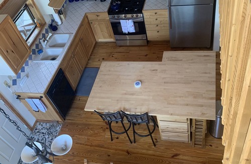 Angel Fire Cabin | Enjoy the hot tub under the stars and ponderosa pines!