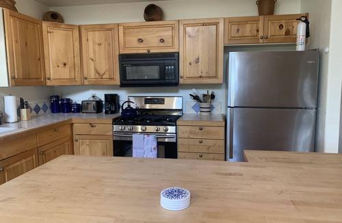 Angel Fire Cabin | Enjoy the hot tub under the stars and ponderosa pines!