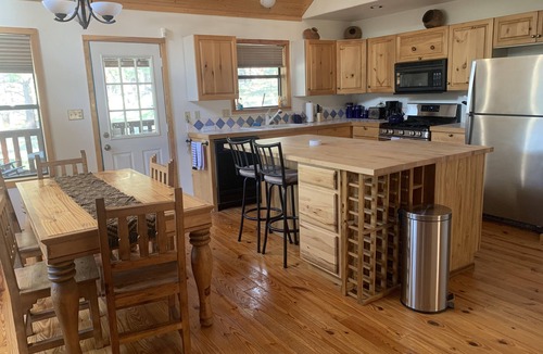 Angel Fire Cabin | Enjoy the hot tub under the stars and ponderosa pines!