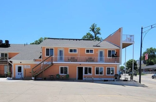 Arnolds Park Apartment | Fantastic Location-Roof Top Patio (shared) and King Bed This suite is on the 2nd level and requires guest to use stairs.
