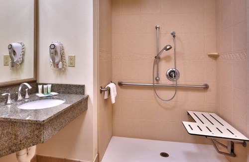 Omaha Condo | Free Breakfast. Pool. Gym. Close to the Children’s Hospital!