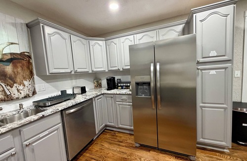 Lawton House | Fun, entertaining home with game room near Fort Sill, restaurants, & shopping.