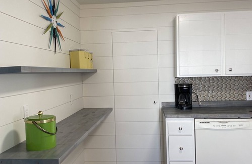 Ogallala House | Fun MidMod home remodeled with private back yard.
