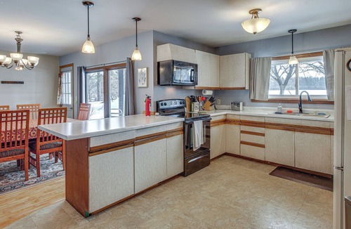 Waupaca House | Group Friendly! Riverfront Waupaca Retreat w/Yard
