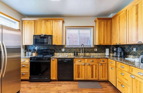 St. Louis Condo | Historic 2BR with Deck, Games & Garage