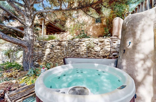 Taos House | Historic dog-friendly hacienda with 2 casitas, fireplaces, on-site hot tub, yoga
