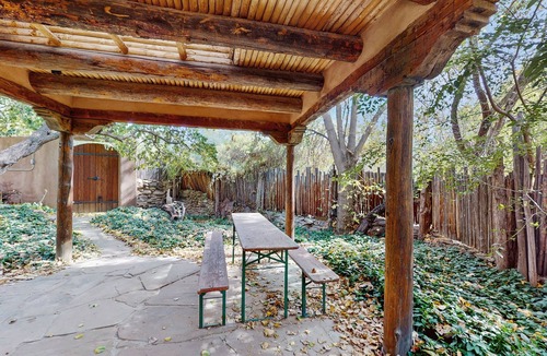 Taos House | Historic dog-friendly hacienda with 2 casitas, fireplaces, on-site hot tub, yoga