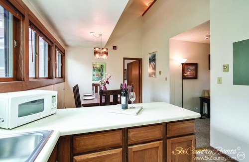 Historic District Condo | Ideal Breck Location! Modern Updates Throughout. Private Balcony. SH52