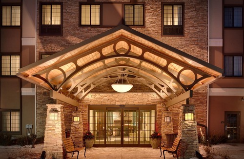 Omaha Condo | King Suite. Free Breakfast. Pool. Gym. Great for Business Travelers!