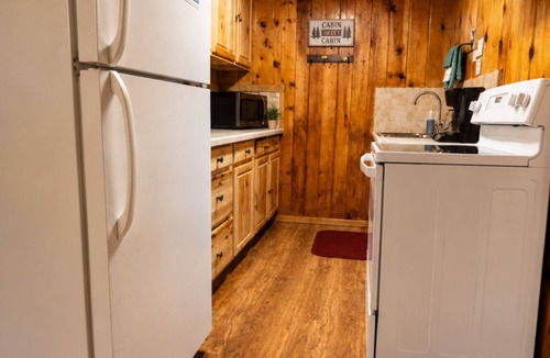 Red River Cabin | Located by the River facing the Mountains