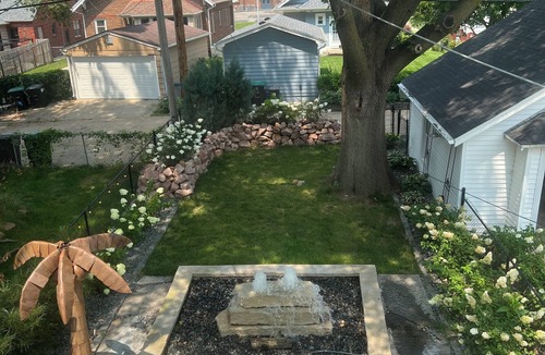 Aksarben - Elmwood Park House | Luxury 4 bedroom house with amazing outdoor lighting and water feature!