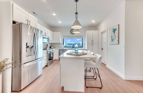 Arnolds Park Villa | Luxury Townhome Across from Arnolds Park | Walk to the Lake, Concerts & Restaurants