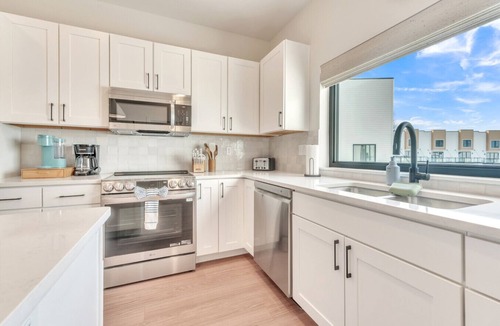 Arnolds Park Villa | Luxury Townhome Across from Arnolds Park | Walk to the Lake, Concerts & Restaurants