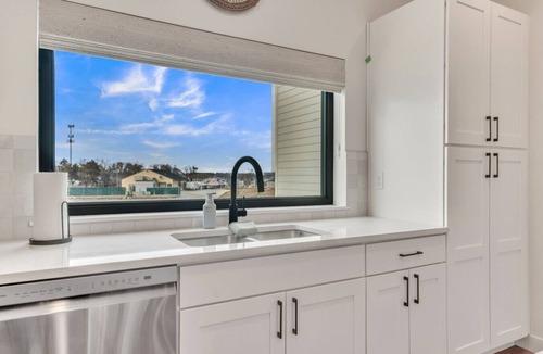 Arnolds Park Villa | Luxury Townhome Across from Arnolds Park | Walk to the Lake, Concerts & Restaurants