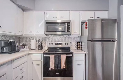 North Central Omaha House | Modern 4BR NW Omaha, Garage, Fenced Yard, EV Charger, W/D, Pet-Friendly