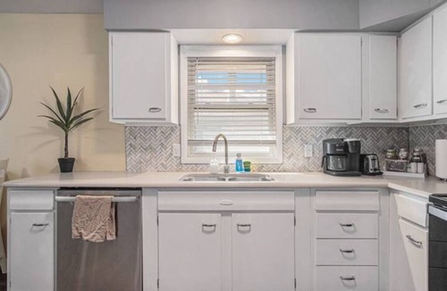 North Central Omaha House | Modern 4BR NW Omaha, Garage, Fenced Yard, EV Charger, W/D, Pet-Friendly